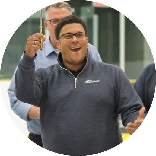 Dennis Rogers at ribbon cutting